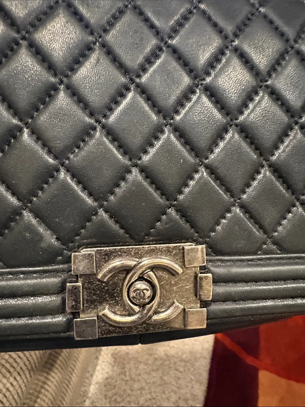 CHANEL Black Quilted Boy Crossbody with Silver CC Lock